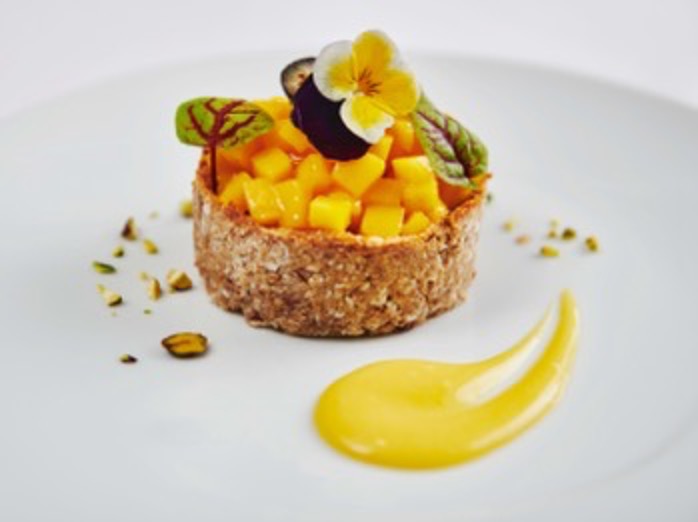 Mango-Lime Tart with Mango Coulis and Toasted Pistachios